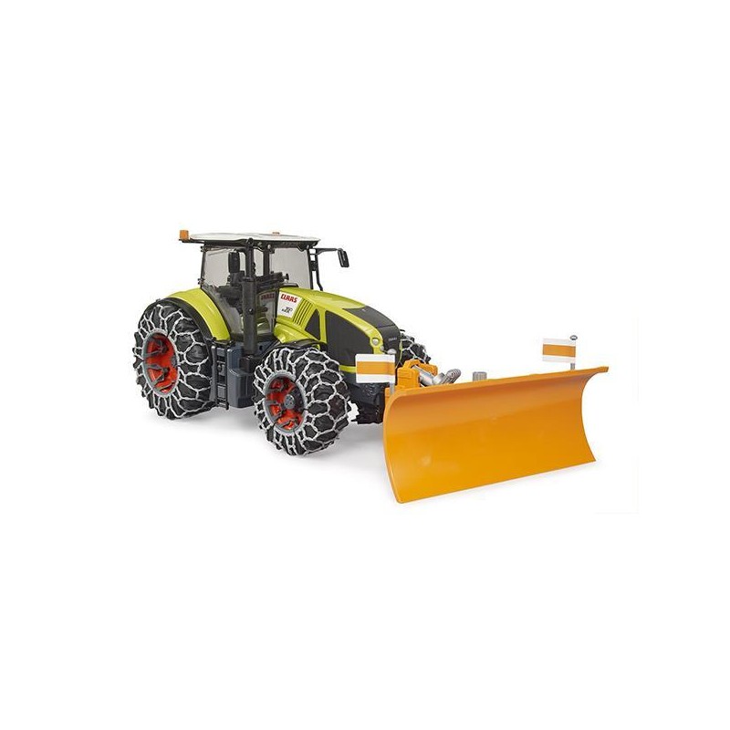 Tracteur Claas Axion 950 avec chaînes à neige et lame de charrue
