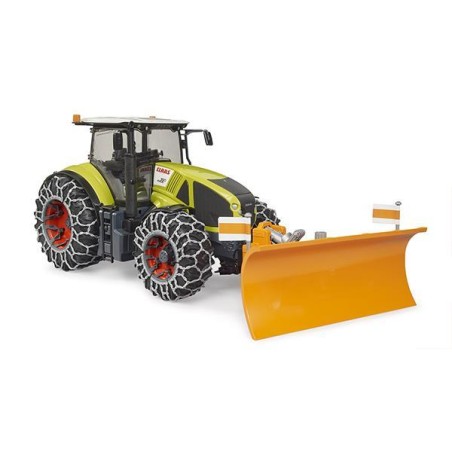 Tracteur Claas Axion 950 avec chaînes à neige et lame de charrue