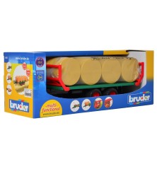 Remorque à balles avec 8 bottes de paille rondes