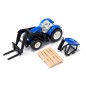 Tracteur New Holland avec fourche de palettes et palette inclue