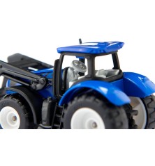 Tracteur New Holland avec fourche de palettes et palette inclue