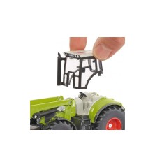 Tracteur avec chargeur, dolly et benne