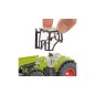 Tracteur avec chargeur, dolly et benne