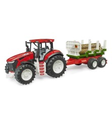 Tracteur Roadmax avec remorque forestière et 3 troncs